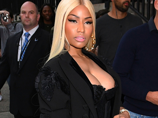 Nicki Minaj suffers an embarrassing nip slip outside of the Marc Jacobs fas...